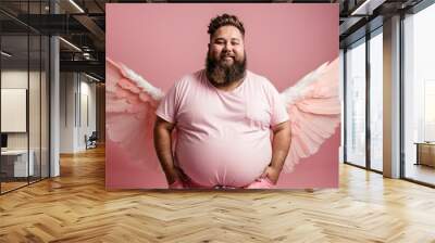 Winged fat man with mustache and beard uses a white t-shirt on a pink background Wall mural