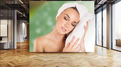 beautiful woman handle towel in spa salon, after bath Wall mural