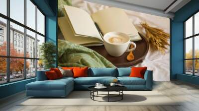 Cozy coffee cup cappuccino with notebook and pen in wooden board , morning bed coffee, vintage coffee cuo, morning coffee still life Wall mural