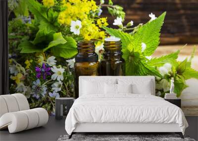 Herbal medicine with plants exracts and essence bottles Wall mural