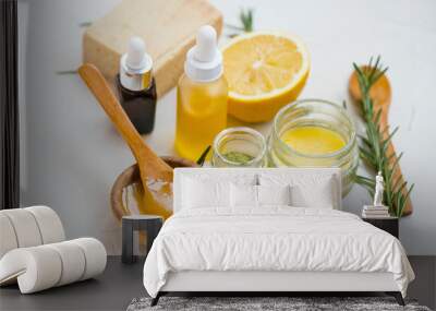 natural skincare ingredients with manuka honey, lemon, essential oil, clay, balm, rosemary herbs and Wall mural