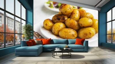 Young baked potatoes Wall mural