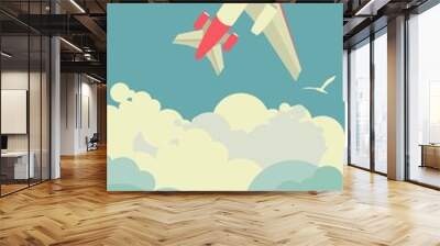 The plane flies against the sky Wall mural