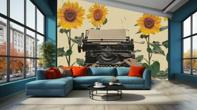 A minimalist photo collage artwork features the image of arms typing on a vintage machine set against a backdrop of sunflowers growing.  Wall mural