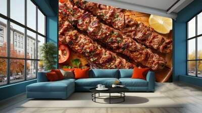 Top view photo of traditional Turkish food, Adana Kebab, served on a wooden plate. Wall mural