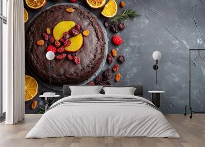 Caribbean Black Cake surrounded by dried fruits, isolated on a slate gray background with minimalist design elements Wall mural