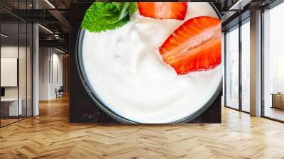 Bowl of tasty fresh sour cream on a dark background Wall mural