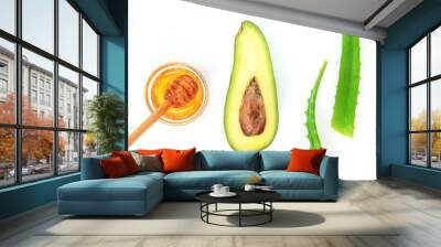 Natural skin care products, top view ingredients avocado, aloe and honey on white background Wall mural