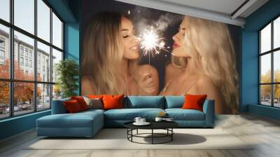 2 girls sharing a kiss of friendship at a party, happy and joyful times celebration Wall mural