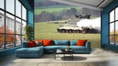 a british army Challenger II main battle tank creating a thick white smoke screen whilst on maneuvers, Salisbury Plain Wall mural