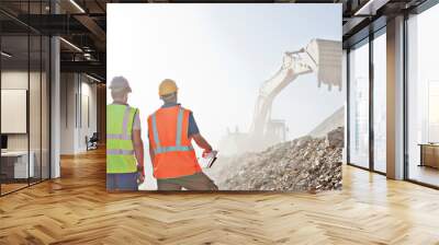 workers watching digger in quarry Wall mural