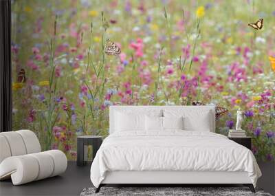 Field with spring flowers and butterflies Wall mural