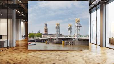 Summer view of the river IJssel with entrance bridge of the Hanseatic historic city of Kampen, The Nertherlands Wall mural