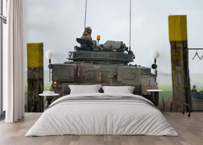 British army Warrior FV510 fighting vehicle tank at a road crossing, Wilts UK Wall mural