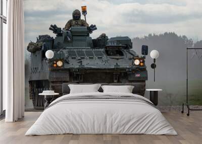 British army Warrior FV512 mechanized recovery vehicle tank in action on military exercise, Salisbury Plain, Wiltshire UK Wall mural