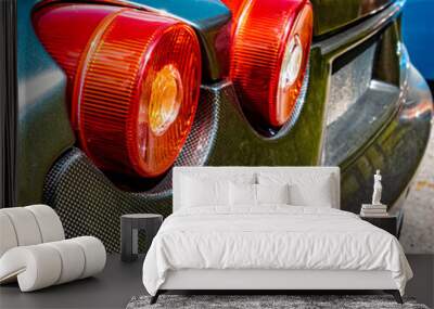 Beautiful rear light details on a famous sports car with lots of carbon fibre Wall mural