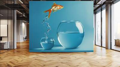 Goldfish jumping in a bigger bowl - aspiration and achievement concept. Wall mural