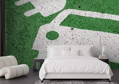 Green electric car parking sign, painted on asphalt Wall mural