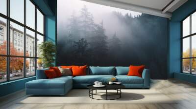 Trees in fog with sun lighting through Wall mural