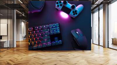 Top down view of various gaming accessories laying on table. Colorful illuminated devices. Wall mural