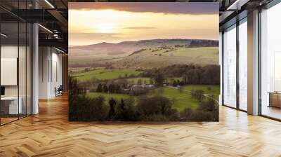 scenic Westerly view over as the golden sun sets over Oare and across the Pewsey Vale valley Wall mural