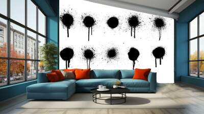 Set of spray paint elements isolated on white background, lines and drips black ink splatters, Ink blots set. Vector Street style. Collection of graffiti spray banner. Spray paint shapes with smudges. Wall mural