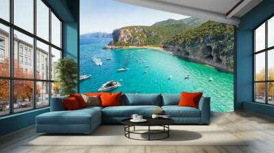 Drone view of the vibrant Cala Luna Beach on Sardinia island, Italy Wall mural