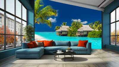 Holiday location on a tropical island with palm trees and amazing vibrant beach Wall mural