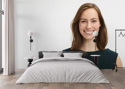 portrait of a beautiful woman smiling to camera looking confident Wall mural