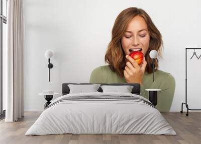 portrait of happy young woman red apple Wall mural