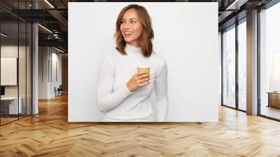 portrait of happy young woman with to go cup of coffee Wall mural