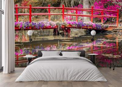 Bridge over a pond full with blooming flowers in South Carolina, USA Wall mural