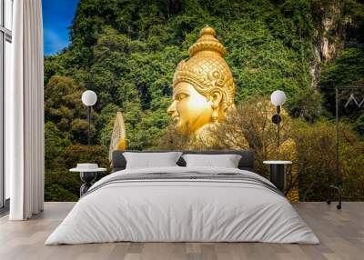 The golden Buddha in front of the Batu Caves, Kuala Lu,pur, Malaysia Wall mural