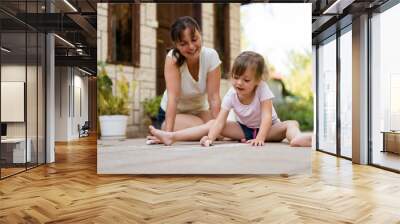 Being together - mother and child playing together Wall mural