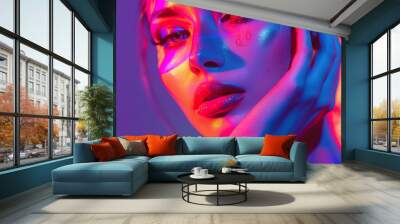 Closeup view of woman eyes with amazing bright eye vibrant makeup in luxurious blue shades. Pink, yellow and blue color, colored eyeshadow with copy space, banner concept Wall mural