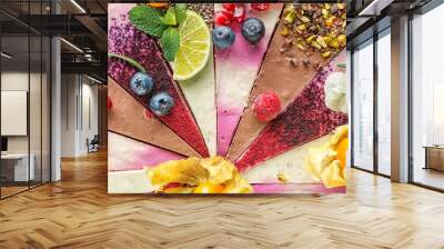 raw vegan cakes with fruit and seeds, decorated with flower, product photography for patisserie. col Wall mural