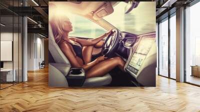 sexy young woman driving with the car, fashion and glamour photography, on the road Wall mural