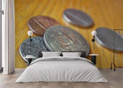 Set of silver Quarter Dollar coins (currency in the USA, American Dollar, USD) on the wooden background Wall mural