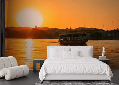 An evening cruise watching the sunset over the Nile Wall mural