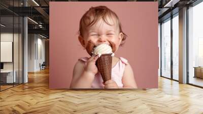 Adorable young infant brown hair beams cheerful smile. Infant enjoying her playful time captivating soft look. Little one can't get enough of their ice cream. Wall mural