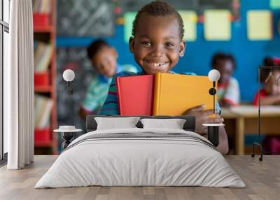 Cheerful child hugging his books radiating happiness and innocence. Enthusiastic student clutching vibrant books cheerful classroom. Pure joy of childhood innocence and education. Wall mural