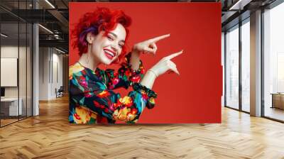 Modern and captivating her hair's vibrant hues speak volumes. Sophisticated yet whimsical her vibrant hair and style stand out. Youthful exuberance captured daring bold fashion statement. Wall mural