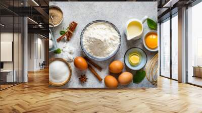 baking background ingredients flour sugar eggs and others at light stone table top view with copy space Wall mural