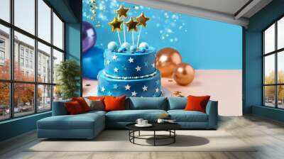 blue two tier birthday cake with star decorations and balloons on colorful background Wall mural