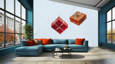 two colorful christmas gift boxes to another, both against the winter sky. Wall mural