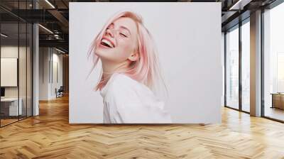 beautiful pretty young woman pink blond hair style in white clothes posing on white background, pretty cute candid beauty portrait, natural look, emotional smiling Wall mural