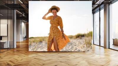 stylish attractive slim smiling woman on beach in summer style fashion trend outfit Wall mural