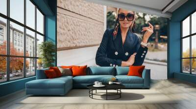 stylish attractive woman street fashion in suit Wall mural