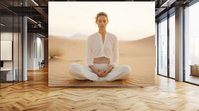 editorial film photo of a young white woman sitting in mindful meditating in nature by desert/sand for peace/clarity/mental wellbeing/balance magazine style Wall mural