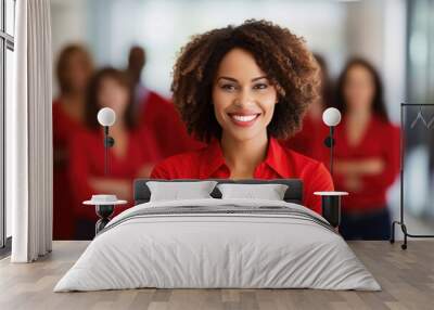 group of people standing in office, confident black woman wearing red leading corporate team with confidence  Wall mural